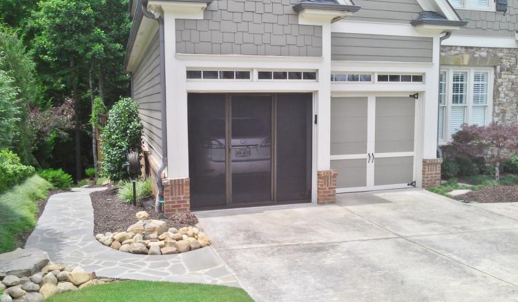 Rolling Mosquito Screen Attaches To Your Garage Door Track - Lifestyle screens garage door bug screen with sliding door