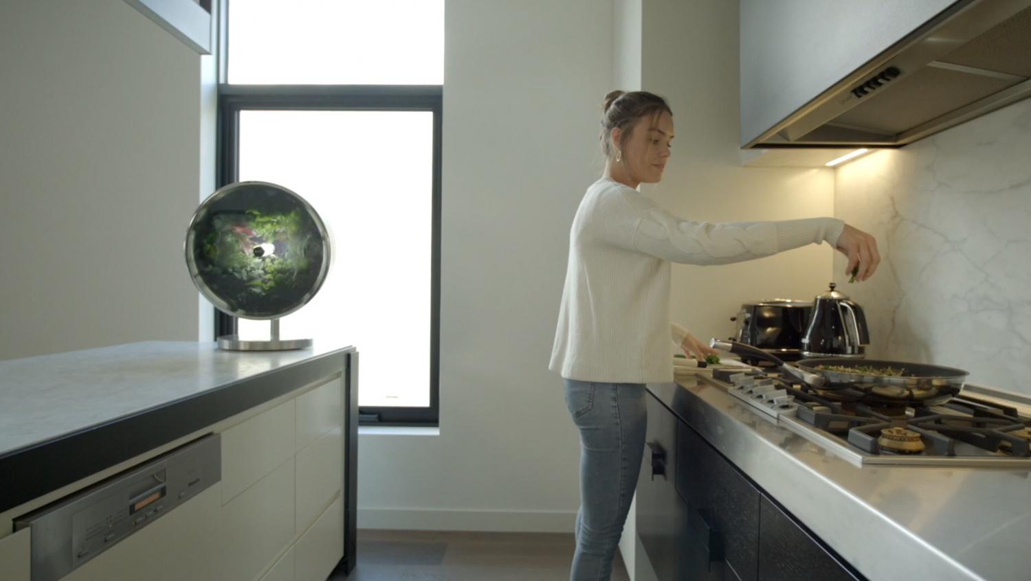 Rotating NASA-Inspired Indoor Garden Provides Full Garden In Just 1.7 Feet - Rotofarm modern futuristic cylinder garden