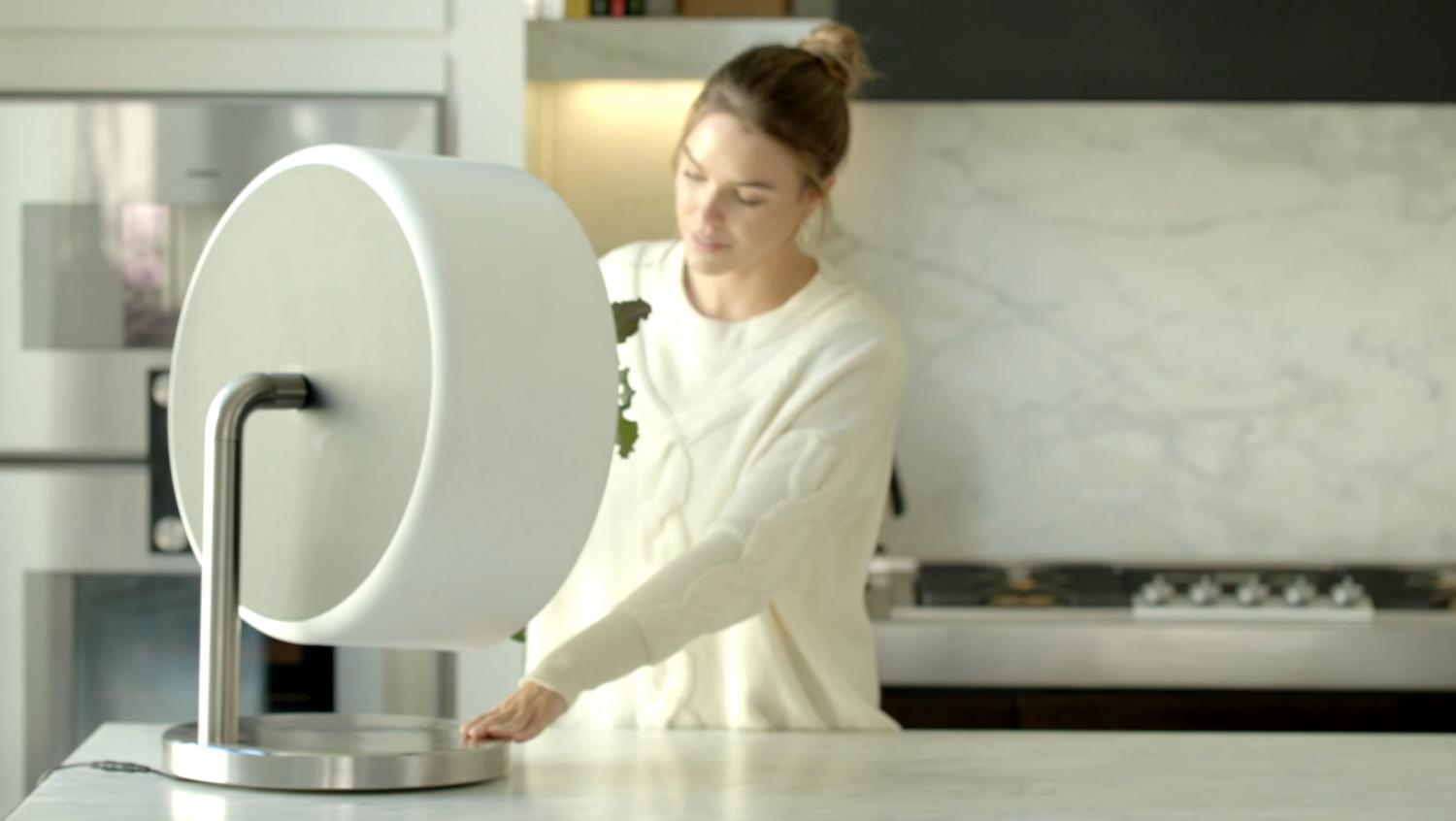 Rotating NASA-Inspired Indoor Garden Provides Full Garden In Just 1.7 Feet - Rotofarm modern futuristic cylinder garden