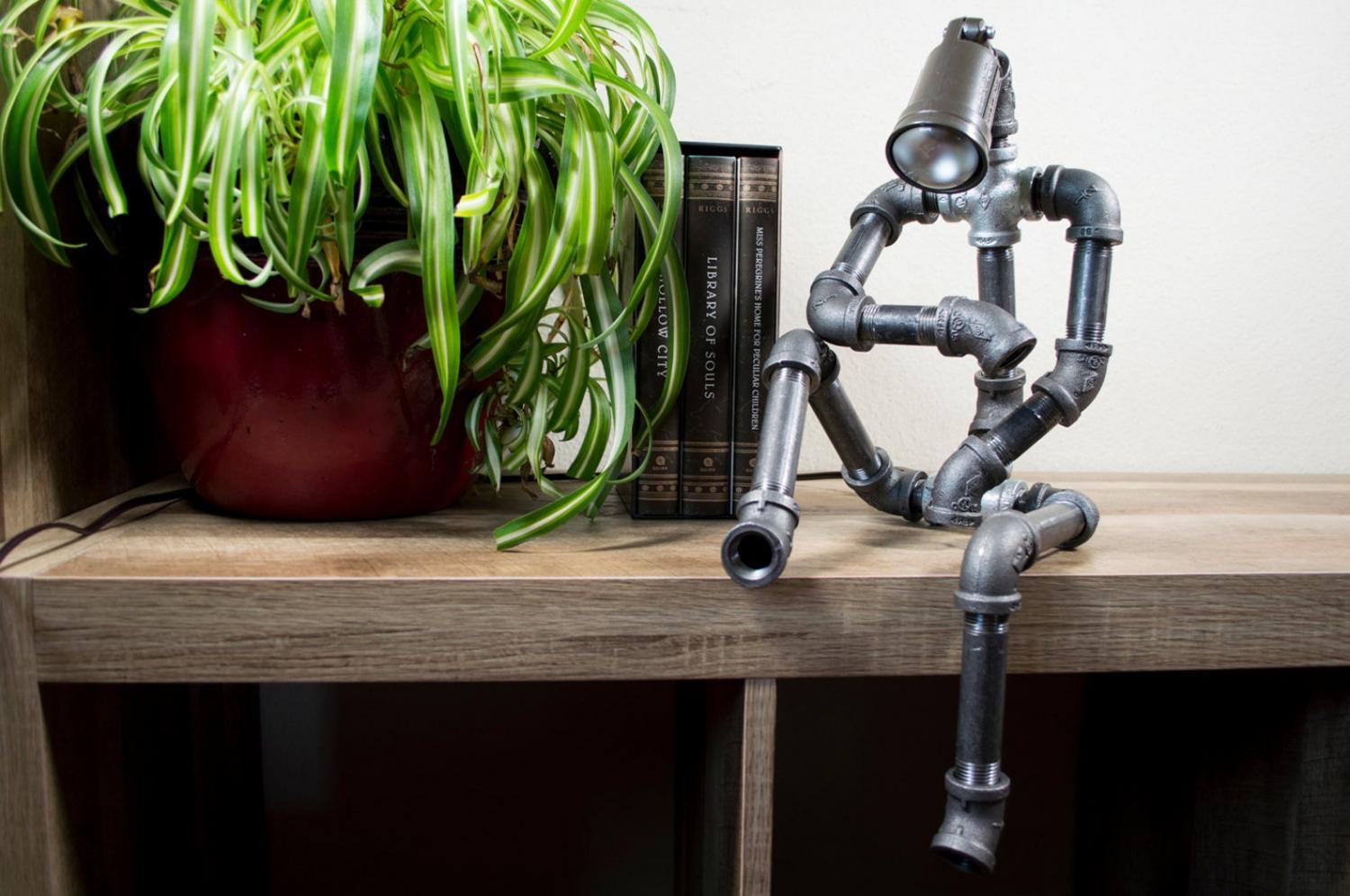 Sitting Pipe Robot Lamp - Industrial design thinking pipe man with lamp for head