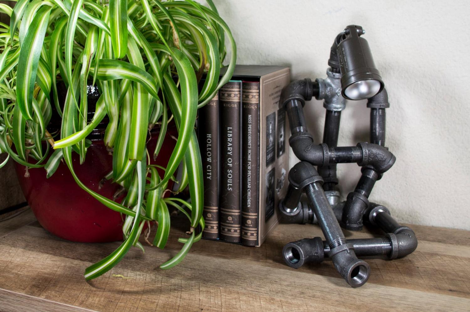 Sitting Pipe Robot Lamp - Industrial design thinking pipe man with lamp for head