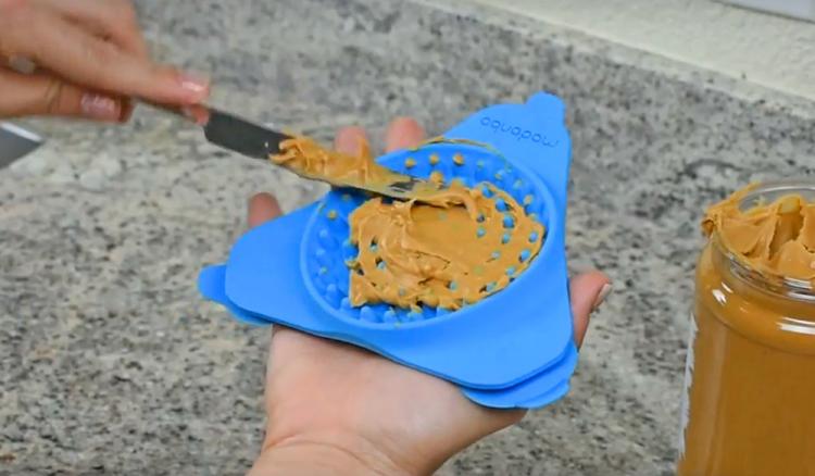 Slow Treater: Wall Mounted Treat Lick To Distract Dogs While Bathing - Peanut butter dog bath distraction tool