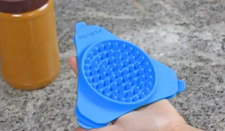 Slow Treater: Wall Mounted Treat Lick To Distract Dogs While Bathing - Peanut butter dog bath distraction tool