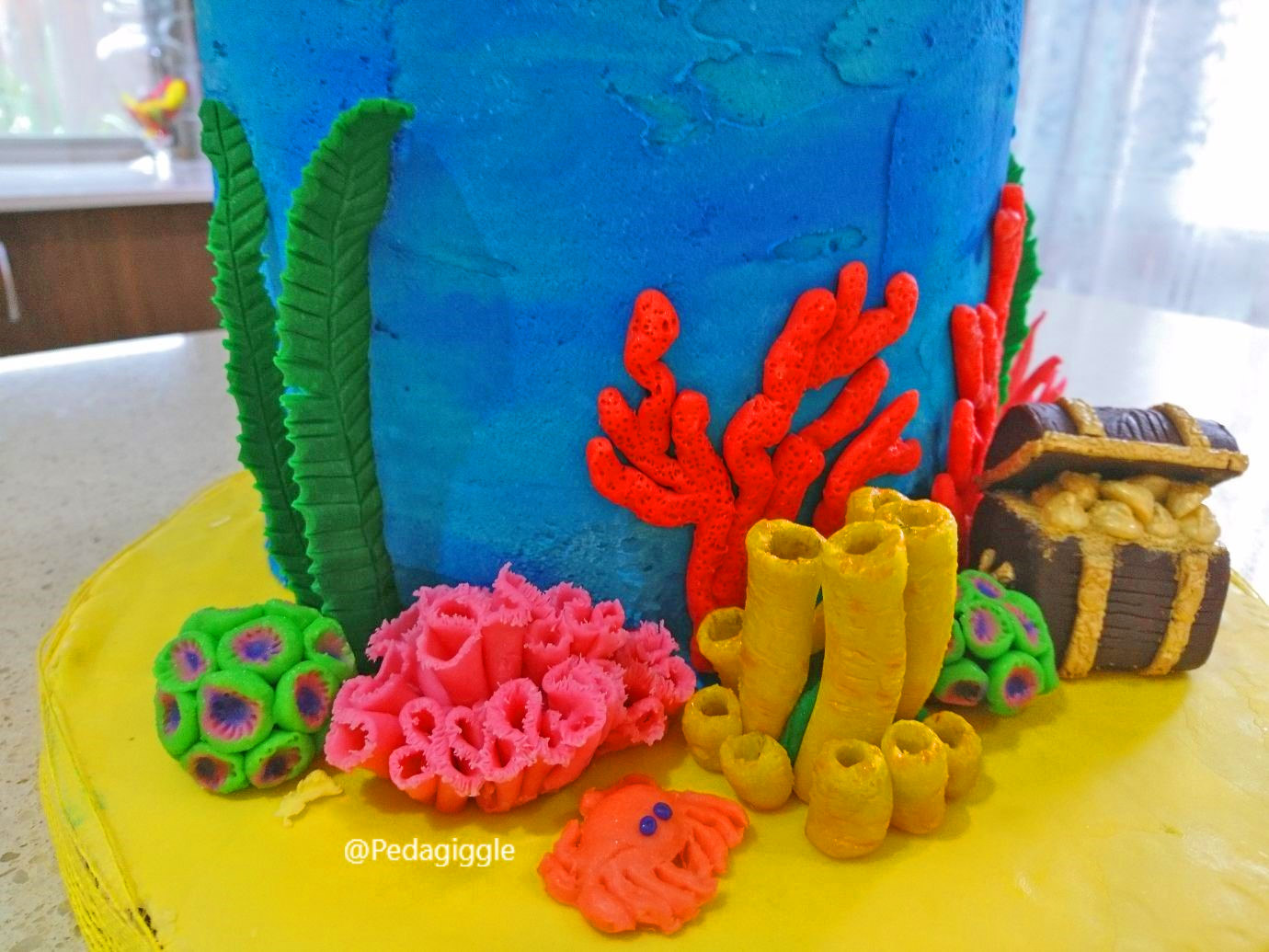 Extravagant pirate ship birthday cake that's being attacked by a giant octopus