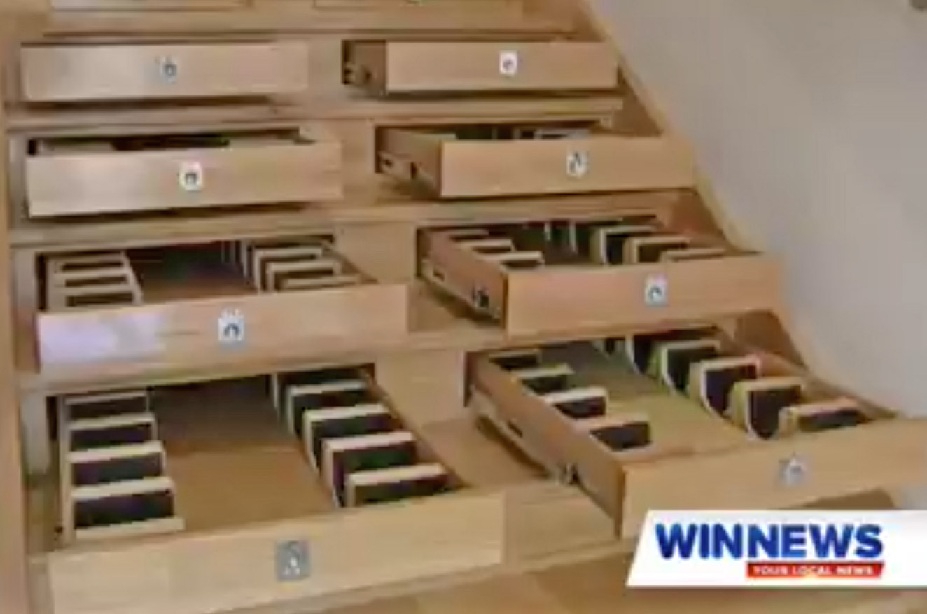Builder Turned Their Staircase Into an Incredible Wine Cellar - Staircase wine storage drawers system