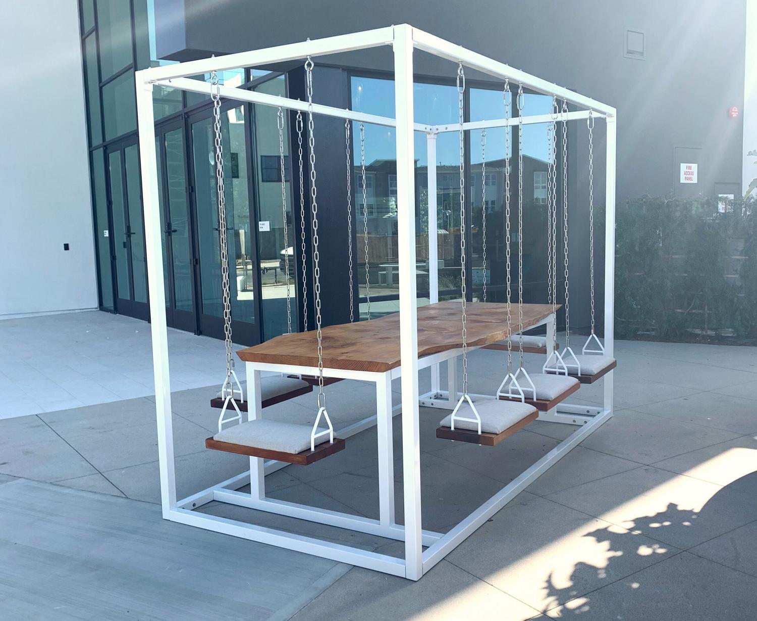 Swing Tables Let You Swing While You Eat or Have a Meeting