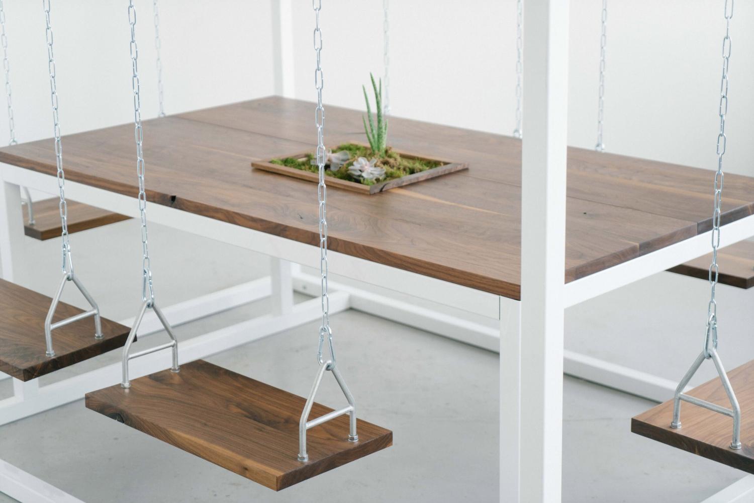 Swing Tables Let You Swing While You Eat or Have a Meeting