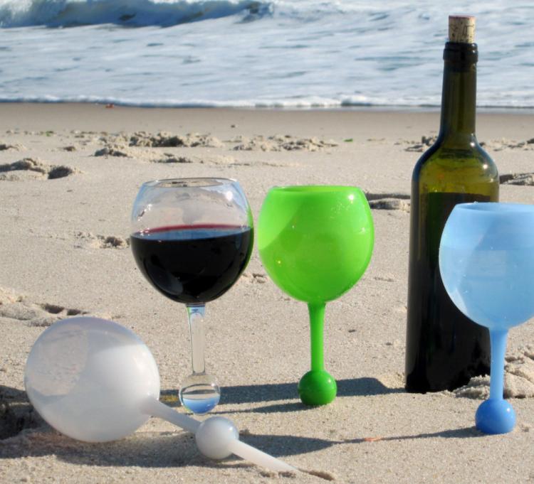 The Beach Glass - Floats In Water - Stabs Into Sand