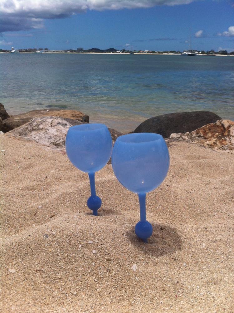 The Beach Glass - Floats In Water - Stabs Into Sand