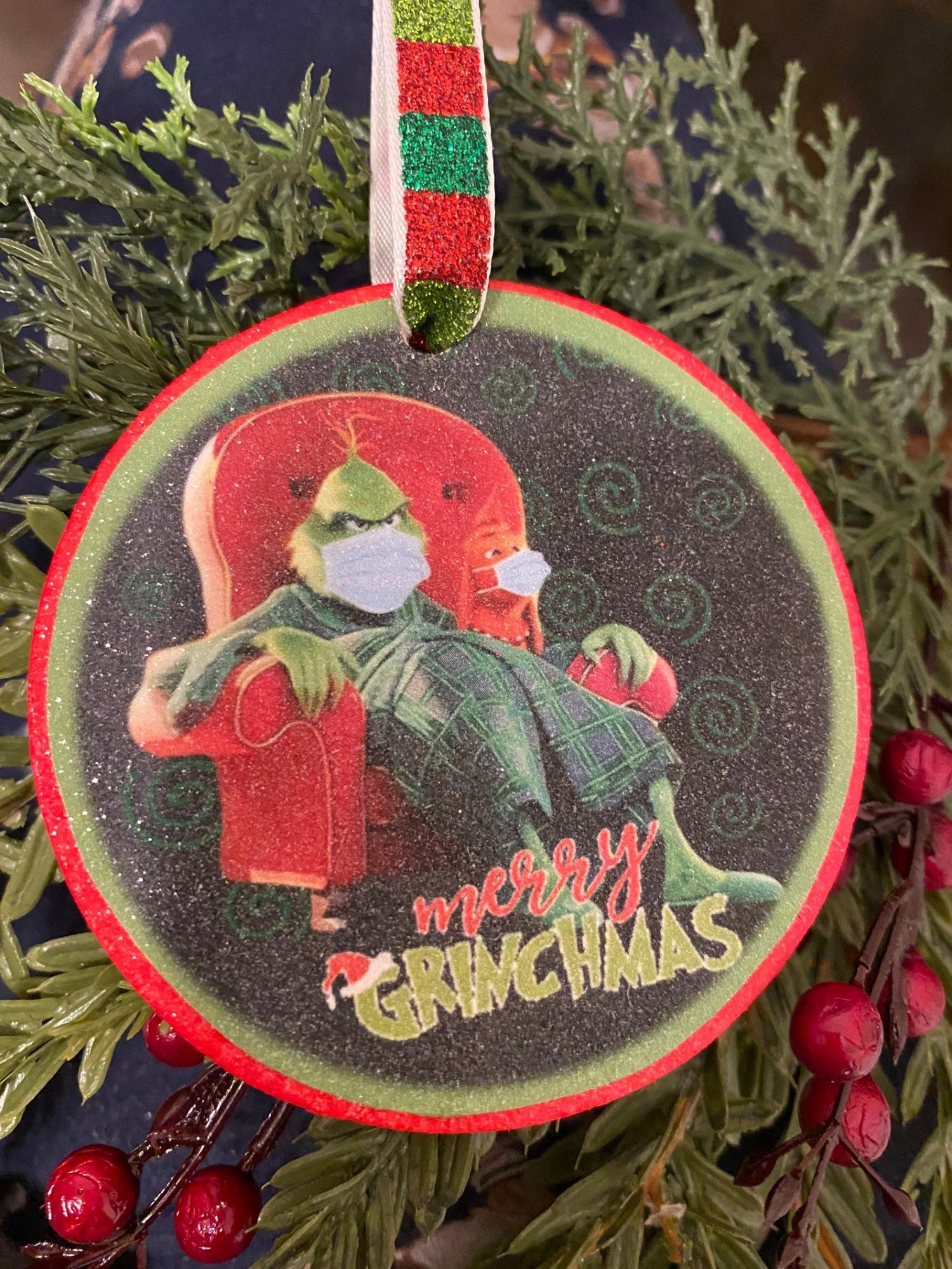 Grinch Sitting In Chair With Facemask Christmas Ornament Grinch Sitting In Chair With Facemask Christmas Ornament