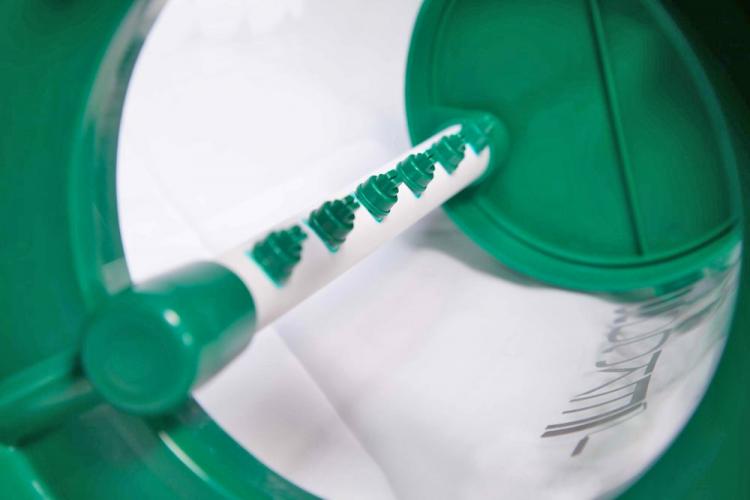 The Rocket Paint Roller Cleaner - Automatic paint roller cleaner attaches to garden hose