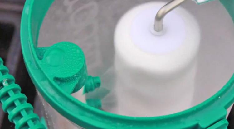 The Rocket Paint Roller Cleaner - Automatic paint roller cleaner attaches to garden hose