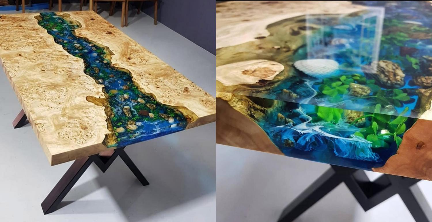 This epoxy table is made to look like a river with real natural life inside of it