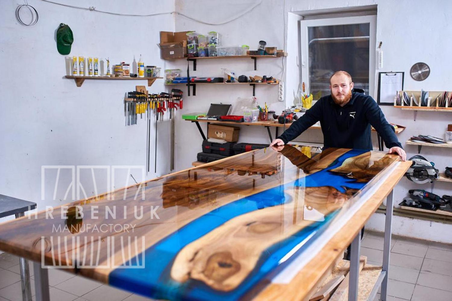 large dinner table epoxy table made to look like a flowing river