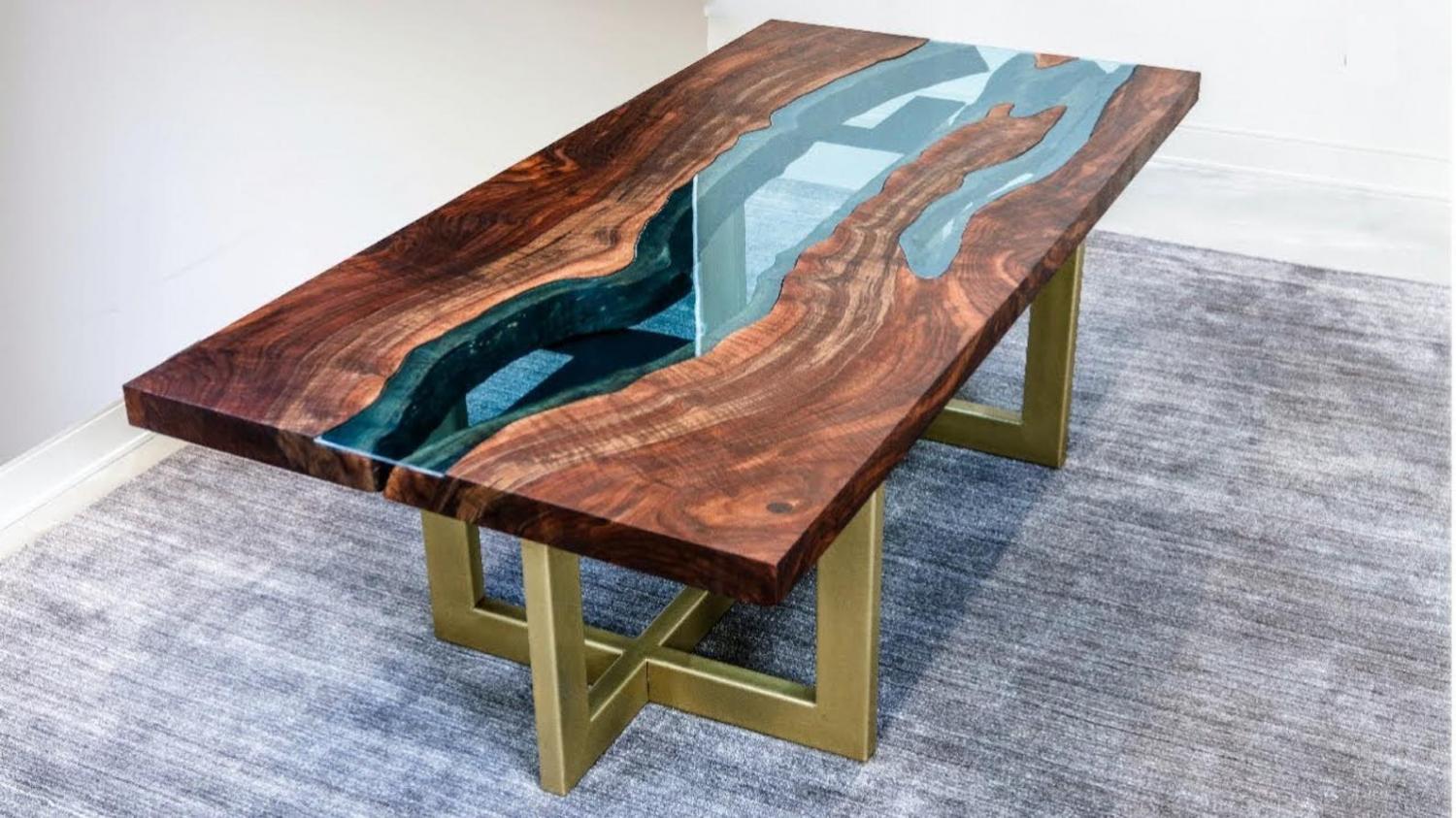 A beautiful epoxy table with a clear river running through it. Makes a perfect dinner table.