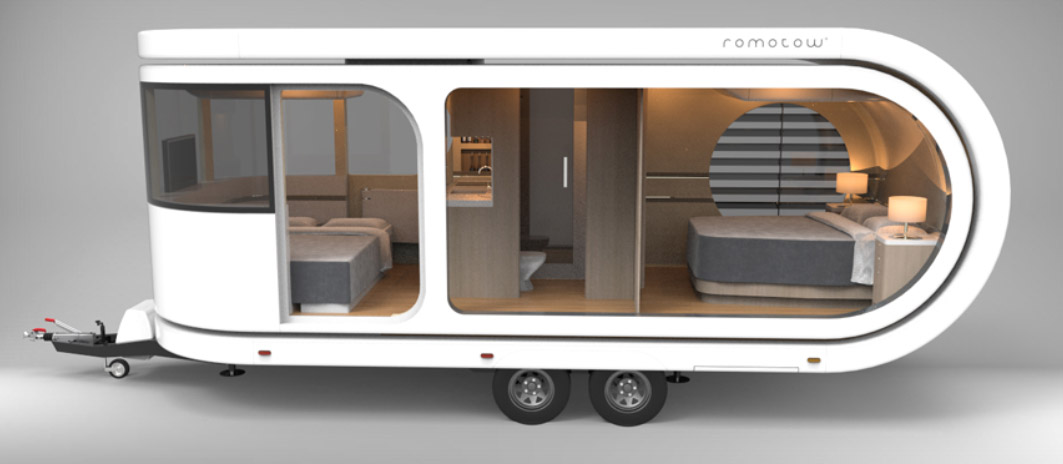 Futuristic Camping Trailer Rotates Around To Reveal Huge Party Deck - Romotow swiveling luxury camper