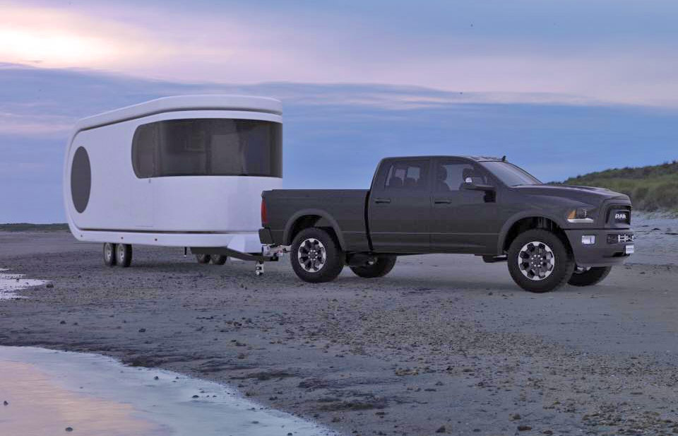 Futuristic Camping Trailer Rotates Around To Reveal Huge Party Deck - Romotow swiveling luxury camper