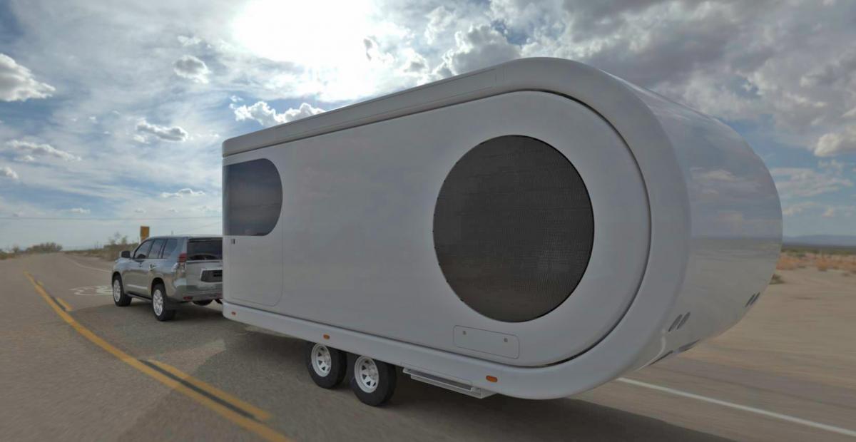 Futuristic Camping Trailer Rotates Around To Reveal Huge Party Deck - Romotow swiveling luxury camper