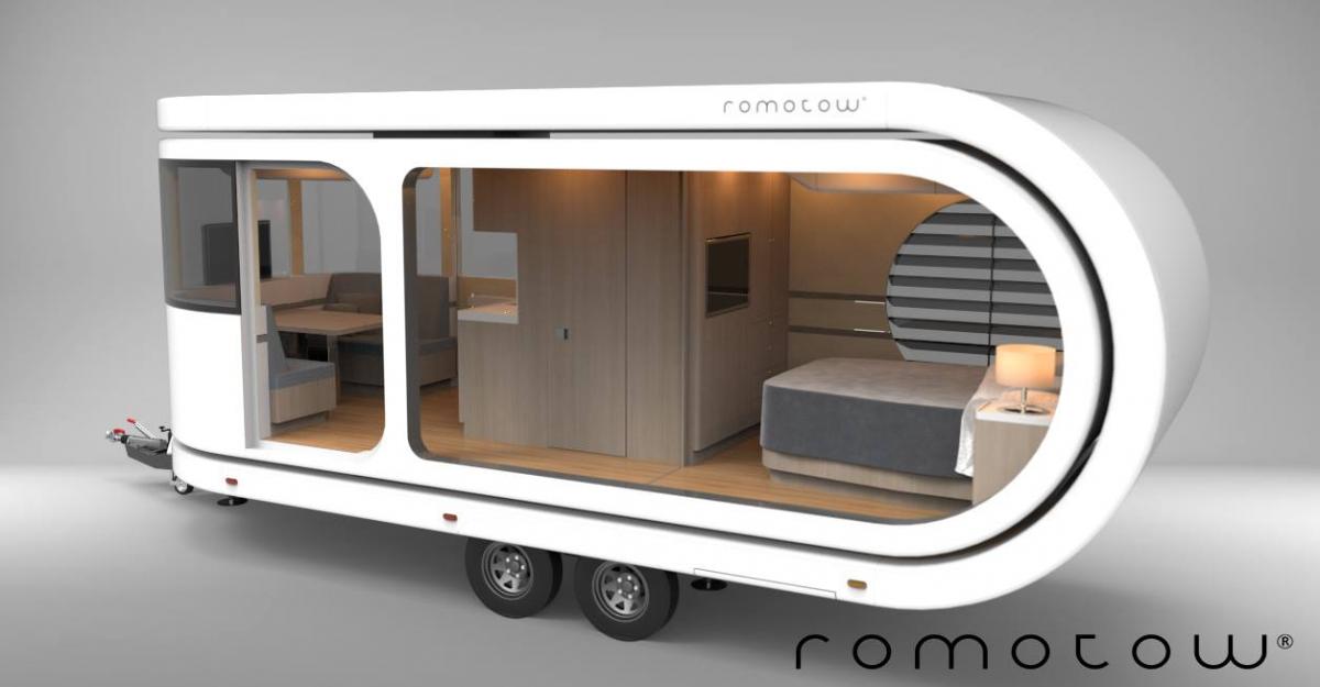 Futuristic Camping Trailer Rotates Around To Reveal Huge Party Deck - Romotow swiveling luxury camper
