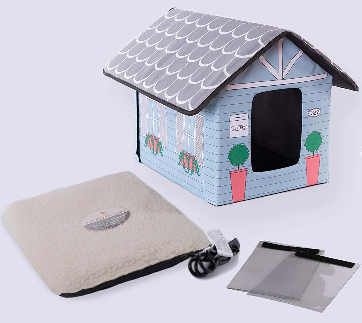 Heated Outdoors Cat House - Electric cat house keeps kitties warm while outside during winter