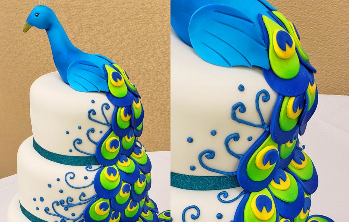 Peacock Wedding Cake - Creative three-layer peacock cake uses cupcakes for the tail of the bird