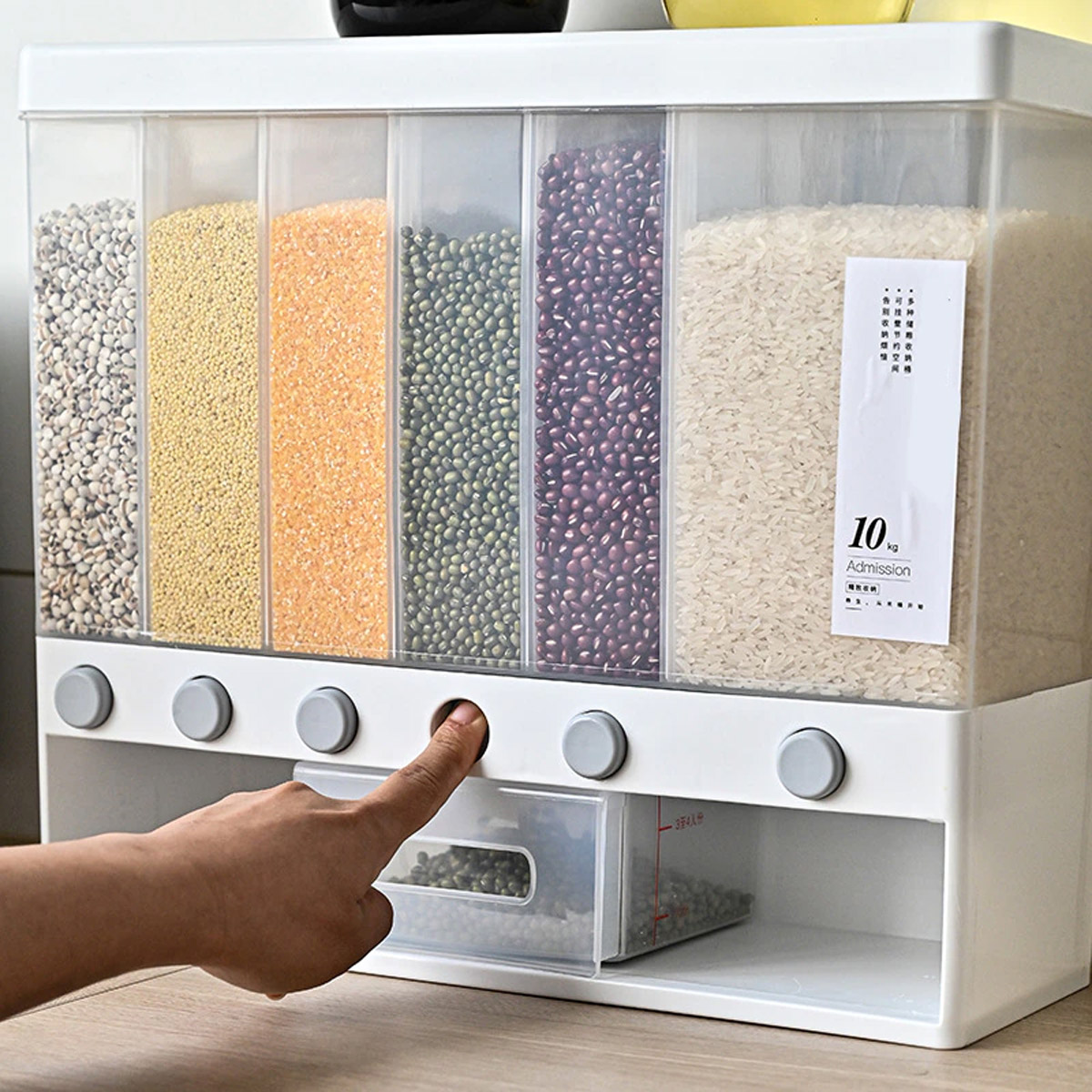 Push button wall mounted food dispenser