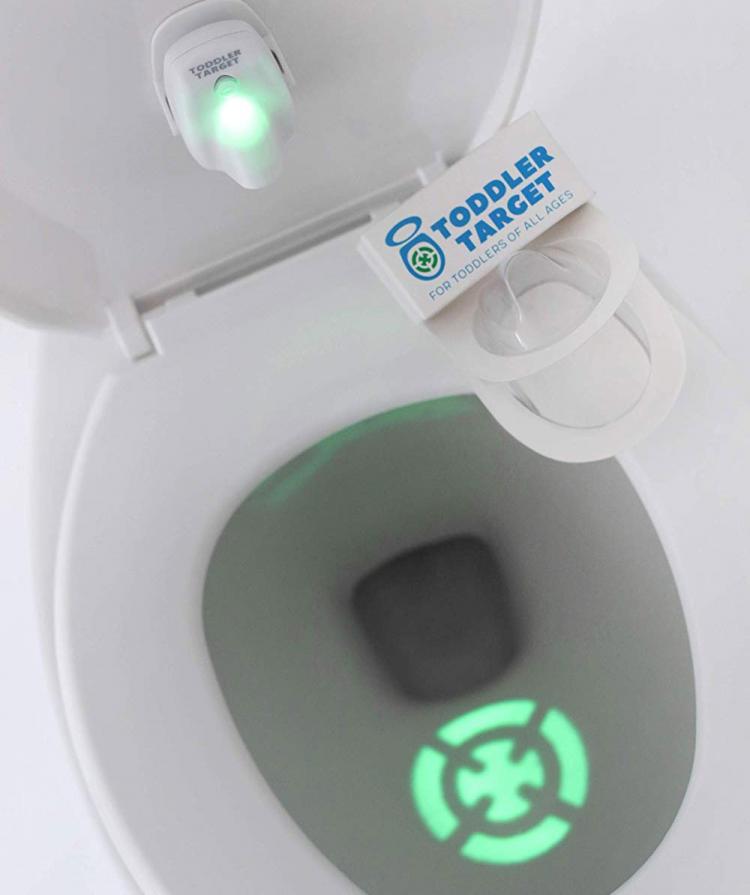 Toddler Target Toilet Light Helps Potty Train - Projected target shape potty trainer