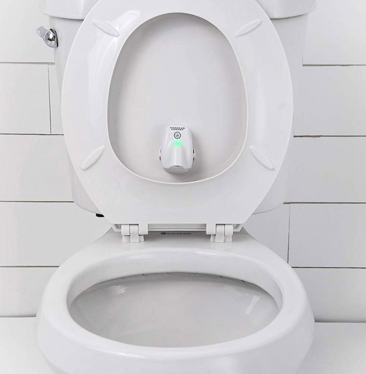 Toddler Target Toilet Light Helps Potty Train - Projected target shape potty trainer
