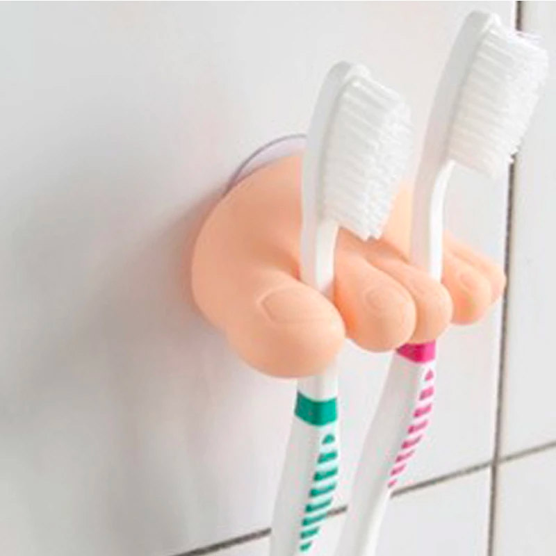 Toes and foot shaped toothbrush holder