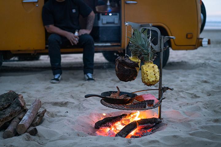  Ultimate Campfire Grill Turns Your Fire Pit Into a Tiered Cooking Machine - Breeo Fire pit cooker with winch