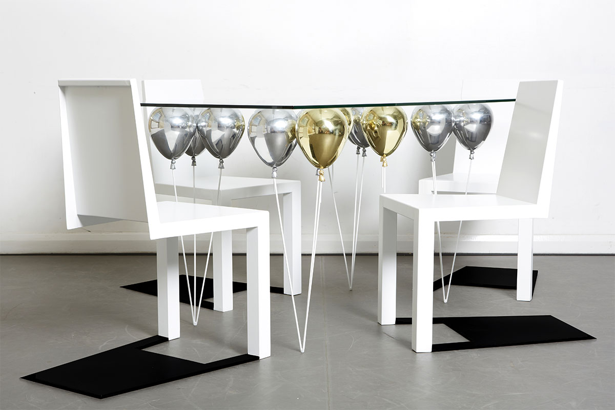 Up Balloon Table - Artsy table using balloons to hold up glass tabletop - Duffy London