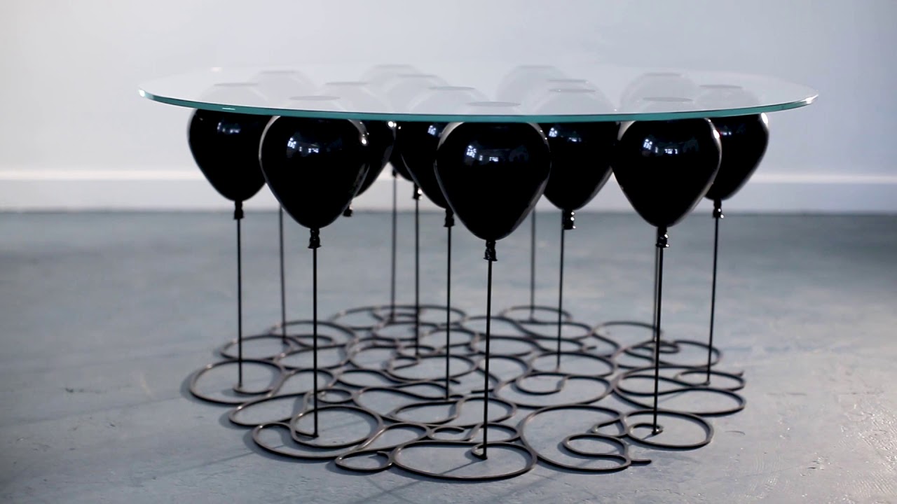 Up Balloon Table - Artsy table using balloons to hold up glass tabletop - Duffy London