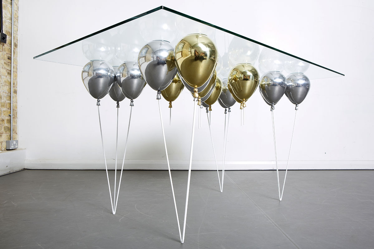 Up Balloon Table - Artsy table using balloons to hold up glass tabletop - Duffy London
