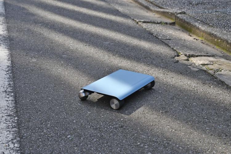 Walk Car: Flat Hoverboard Electric Scooter Looks Like a Laptop - Flat scooter fits into purse