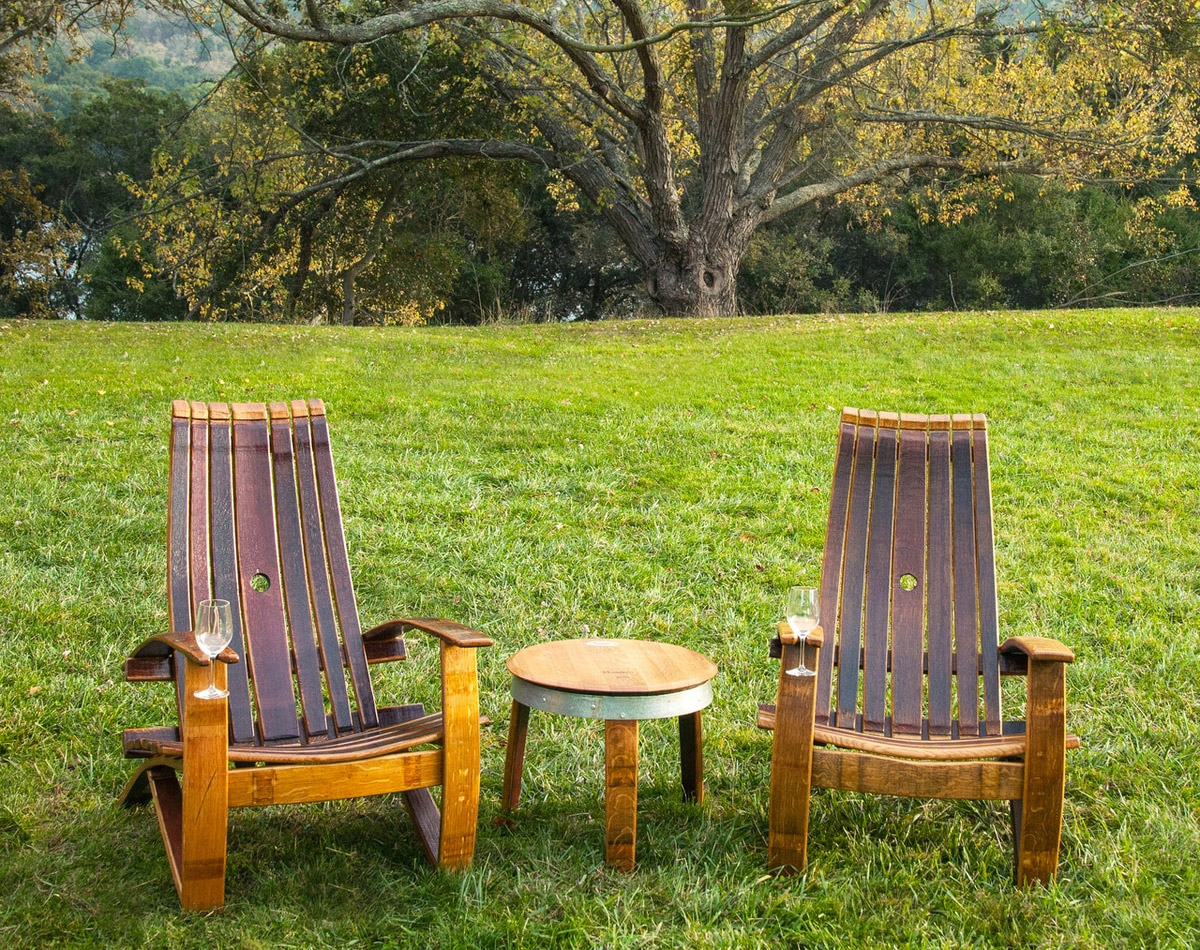 Adirondack Chair Made From an Old Wine Barrel - Wooden Wine Glass holding chair - Wine slot chair