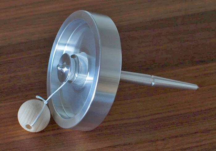 The Wozz - Unique Gyroscope Spinning Top - Uses Spinning Body Science To Spin More Than 30 Minutes