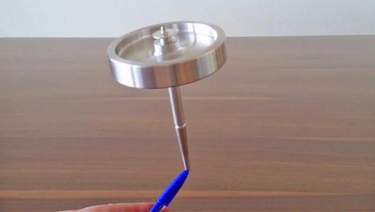 The Wozz - Unique Gyroscope Spinning Top - Uses Spinning Body Science To Spin More Than 30 Minutes