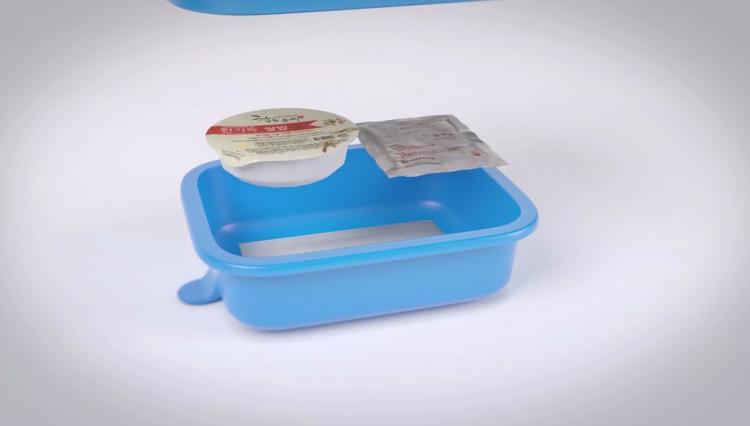 Yabul Flameless Silicone Cooker - Portable heat pack cooker lets you cook hot meal anywhere