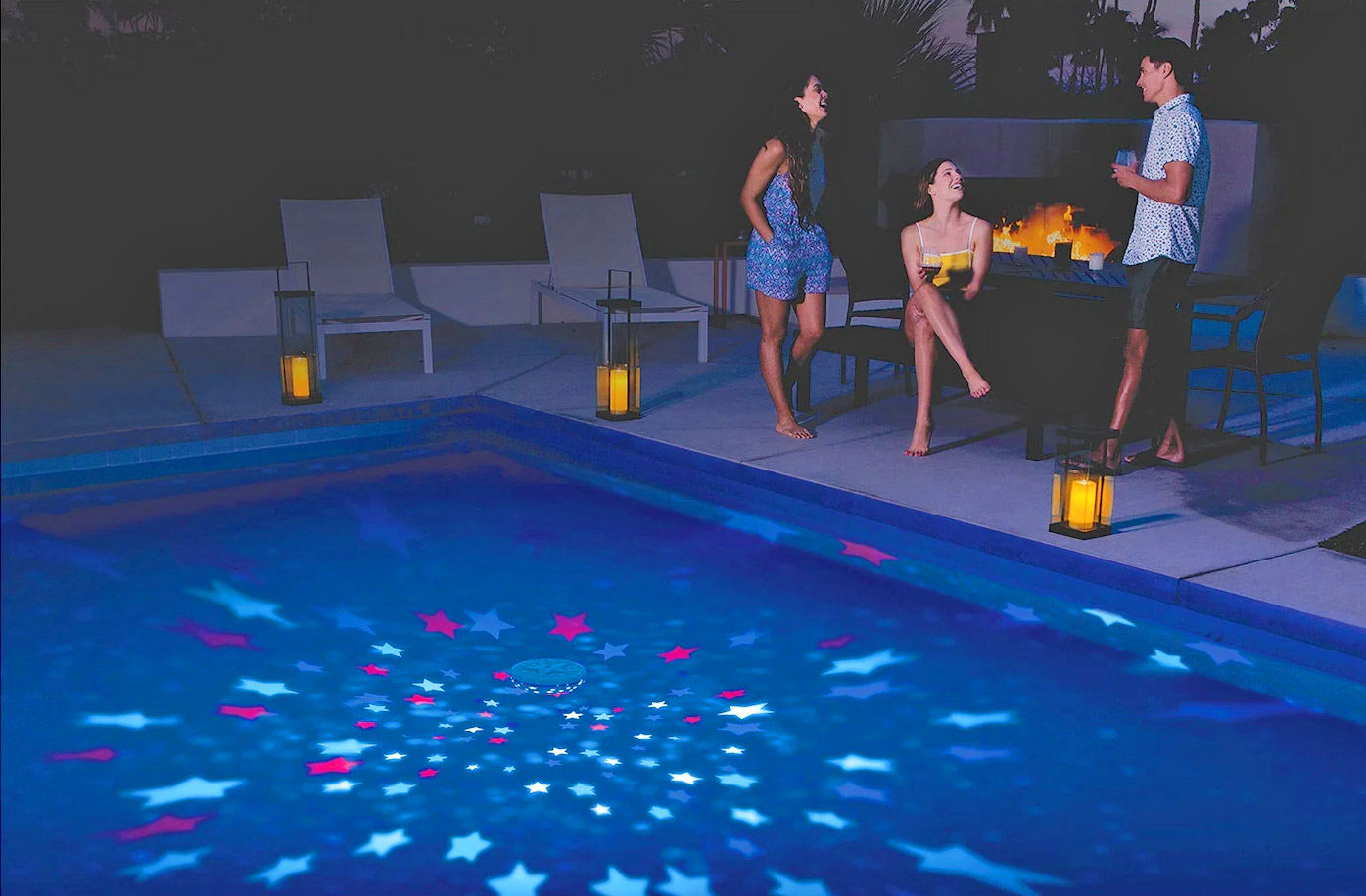 Floating Projection Light Turns Your Pool Into an Aquarium - SwimWays Rainbow Reef Aquarium Pool Light