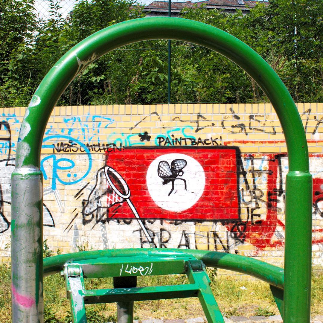 Giant Cat Sticker To Cover Up Racist Graffiti On The Streets
