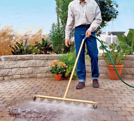 This Power Washing Broom Is a Genius Way To Clean Your Patio Or Garage