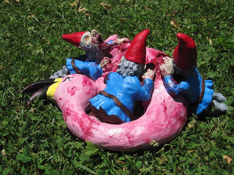 Zombie Gnomes Feasting On Flamingo