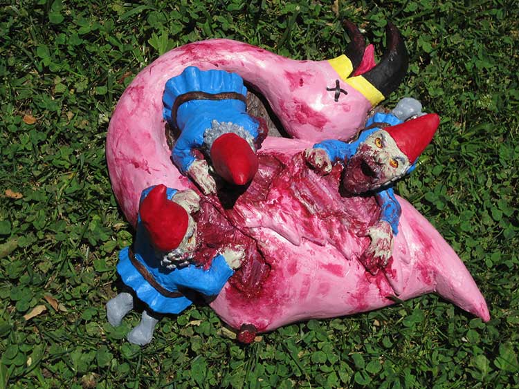 Zombie Gnomes Feasting On Flamingo
